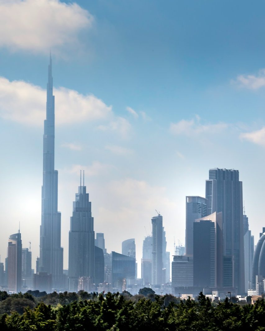 a view of a city with tall buildings